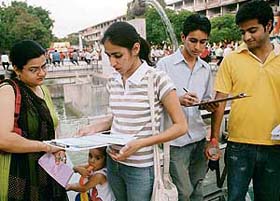 NO DONATIONS PLEASE: Members of We Volunteers, an NGO, carry out an anti-beggary signature campaign in Sector 17 Plaza