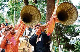 Members of the students central association take out a traditional yatra before the start of their annual function on HPU campus in Shimla