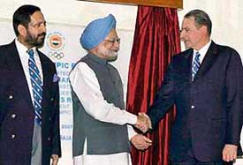 Prime Minister Dr Manmohan Singh shakes hands with Dr Jacques Rogge (right), president, International Olympic Committee, after the inauguration of the Indian Olympic Bhavan in New Delhi on Saturday. 