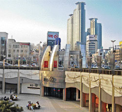 The Seoul skyline as seen from a mall.