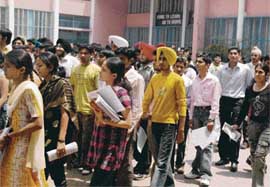 Aspirants come out of Kendriya Vidyalaya, Sector 31, Chandigarh, after taking the AIEEE on Sunday.