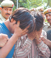 Narender and Ashok, who were involved in the gang rape at Palika Bazar on Saturday, being produced at the Patiala House Court in the Capital on Sunday.