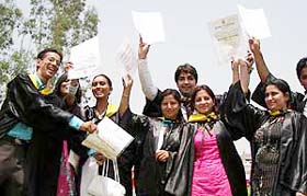 Students of S.A. Jain College celebrate after the annual convocation held on the college campus in Ambala City