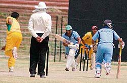 A match between the ONGC XI and the Himachal Cricket Club in progress at the Sector 16 Cricket Stadium in Chandigarh