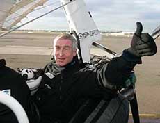 Blind British pilot Miles Hilton-Barber reacts upon arriving at Bankstown Airport in southwestern Sydney after his record breaking flight for a blind pilot from London to Sydney on Monday. 