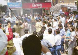A scene of the clash between Congress and BJP workers at Kangra