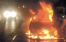 A car caught fire on Tuesday night at Yamuna Bazar flyover near the Hanuman Temple in the Capital.