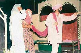 A scene from a play staged at Punjabi Bhawan on May Day on Tuesday.