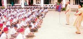 Chokha Ram Kalra addresses students and staff of Sanatan Vidya Mandir Senior Secondary School in Mandi Ahmedgarh on Tuesday. 