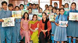On occasion of Labour Day, students of Alpine International School, Ludhiana, pose with their teachers after an art competition. 