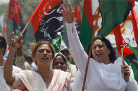 Supporters of the Pakistani joint-Opposition chant anti-Musharraf slogans during a rally in front of the Supreme Court building in Islamabad on Wednesday.