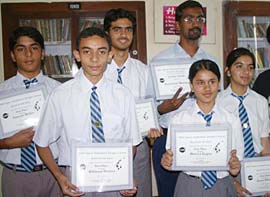 Students of Apeejay School, who won the annual space settlement design contest organised by NASA Ames Research Centre, California, show their certificates during a press conference in Jalandhar on Thursday.