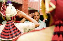 The Chief Justice of the Punjab and Haryana High Court, Justice Virender Kumar Jain, takes a salute at the Guard of Honour presented to him on his arrival in Ludhiana