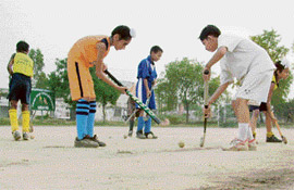 Budding players have to make do with a bumpy surface in the absence of an Astro-turf.
