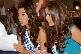 MIRROR, MIRROR... Giannina Silva, Miss Uruguay 2007, and Xiomara Blandino Artola, Miss Nicaragua 2007, get directions for completing registration and fittings for the Miss Universe 2007 competition at the Camino Real Mexico in Mexico City, ahead of the 56th annual Miss Universe competition to be held on 28th May in Mexico Cit
