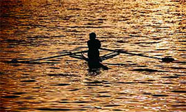 A man enjoys canoeing at Sukhna Lake.