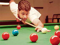 The cueist Vishal Gupta aims his shot at saurabh Khattar memorial billiards and snooker tournament at Chandigarh Club.