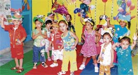 Little ones of Chanda Mama School enjoy themselves at a party thrown for them on the school campus in Ludhiana
