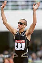 Jeremy Wariner of the US gestures after crossing the finish line in the mens 400-metre final of the IAAF Japan Grand Prix in Osaka on Saturday.