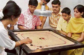 A tie between Surbhi Sharma and Ridhi Kanwar in progress during the 3rd RK Babuta Memorial Prize Money Ranking Carrom Tournament at Saupins School, Sector 9, Panchkula