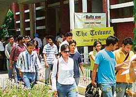 Candidates come out after taking a free mock CAT and scholarship test conducted by Bulls eye in association with The Tribune at DAV College, Sector 10, Chandigarh