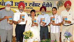 Dr Kulwinder Minhas (centre) with Dr K.S. Aulakh, Dr Surjit Patar and other dignitaries at the release of her book at Punjabi Bhawan in Ludhiana on Sunday.