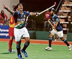 Ragunath celebrates after scoring a goal against China during the 16th Sultan Azlan Shah hockey tournament in Ipoh on Sunday. India won 5-4