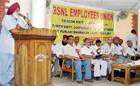 A trade union activist addresses the 4th district conference of Ludhiana Telecom district unit of the BSNL Employees Union in Ludhiana on Monday.