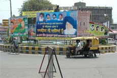 Hoardings of the political leaders installed at the Hall Gate intersection in Amritsar