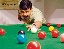Ajay Singla aims a shot during the sixth Saurabh Khattar Memorial Billiards and Snooker Championship held at Chandigarh Club.