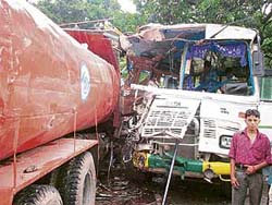 The damaged HRTC bus after its collision with a tanker at Thanpuri in Kangra on Tuesday