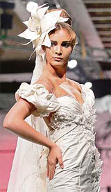 A model presents a Spring/Summer 2007 wedding dress by Lebanese designer Toni Yaacoub in Beirut.