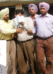 BDPO Puran Chand in vigilance net in Kapurthala on Wednesday. 