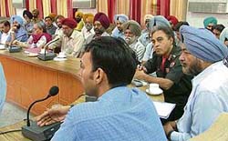 Pryank Bharti, ADC (D), presiding over the quarterly meeting of the Sanik Welfare Board at Bachat Bhawan in Ludhiana on Wednesday