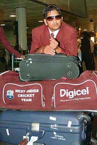 West Indies captain Ramnaresh Sarwan arrives at Londons Gatwick Airport on Wednesday. The West Indies will face England at Lords in the first Test on May 17. 