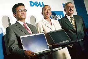 Christine Rand (centre), director, marketing, client products, Dell South Asia and ANZ (Australia and New Zealand), flanked by Sameer Garde (left), general manager, sales, Dell India, and Rajiv Ahuja, director, communications, at the launch of range of notebooks, starting at Rs 52,000, in New Delhi