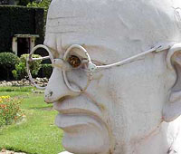 Hornets busy making their nest in one of the eyes of a statue of Mahatma Gandhi at a school on the Chandigarh road in Ambala on Thursday.