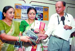 Kathak dancers Nalini and Kamalini being felicitated by Heart Care Foundation of India  president K.K. Aggarwal on the eve of International Nurses Day in the  Capital 