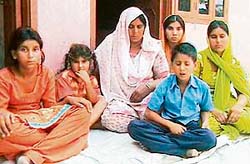 The distressed widow, four daughters and a son of deceased farmer Kashmira Singh who ended his life due to heavy debt on his head.