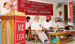 A.K. Bhatnagar, general secretary, NZIEA, addresses a conference of insurance employees in the city