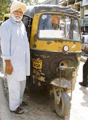 Harbans Singh beside his prized possession