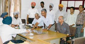 PSEB officials addressing public complaints at sangat darshan in the city