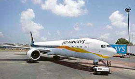 A newly acquired Jet Airways Boeing 777-300ER aircraft sits on the tarmac at Mumbai airport.
