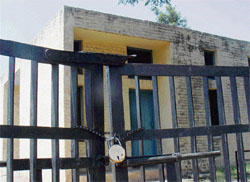 Locked gates of the Harijan Dharamshala in Ram Darbar in Chandigarh.
