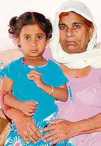 Isha with her grandmother in Phase XI in Mohali on Sunday.