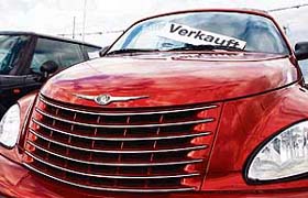 This file photo shows a Chrysler PT Cruiser car with a placard reading "sold" at a dealership in the southern town of Munich