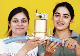Neha Khurana and Sneha Arora show a petrol-diesel gauge at PEC in Chandigarh