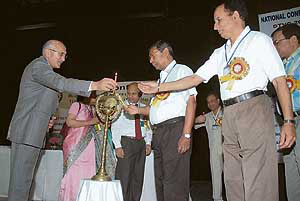 Chairman of the Board of Governors of the National Institute of Technology R.L. Chauhan lights a lamp to inaugurate a two-day national seminar on Design Techniques for Modern Electronic Devices, VLSL and Communication Systems DTVC- 2007, at the institute in Hamirpur on Monday.
