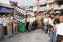 DIG (North Zone) P.L. Thakur flags off a highway patrol squad at Gaggal on Tuesday. The squad will assist tourists and accident victims on the highway.