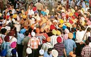 SSF activists burn an effigy of the Dera Sacha Sauda head at the Ghanta Ghar chowk in Ludhiana